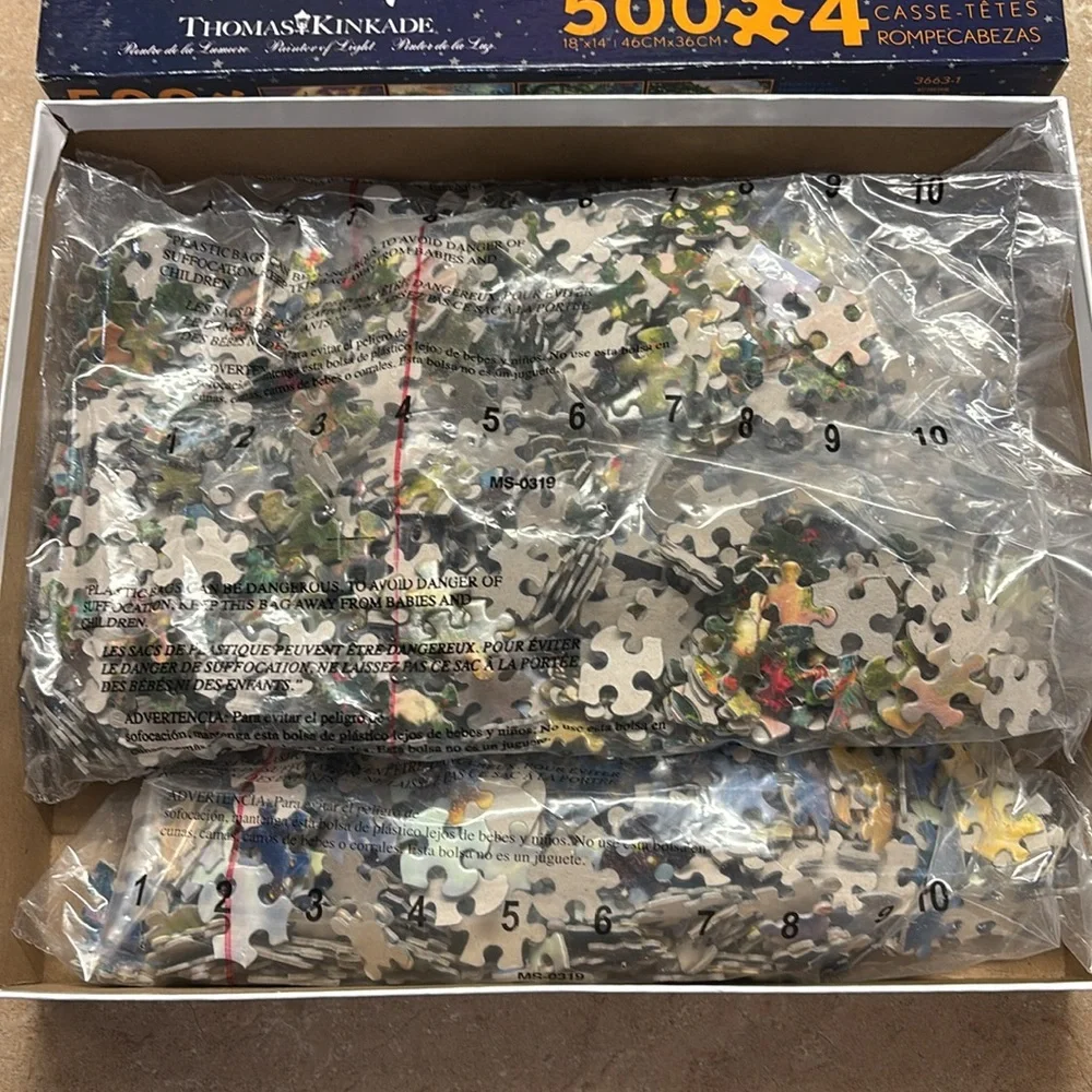Three Disney 500 piece puzzles